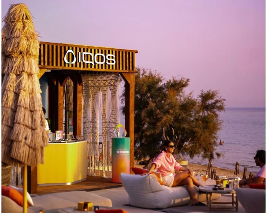 Temporary branded lounge beside the water